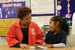 Senior Volunteer with child